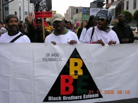 Black Brothers Esteem members wearing BBE t-shirts at a community event in 2005