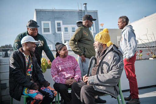 Black Brothers Esteem members gathered together at an SFAF community event